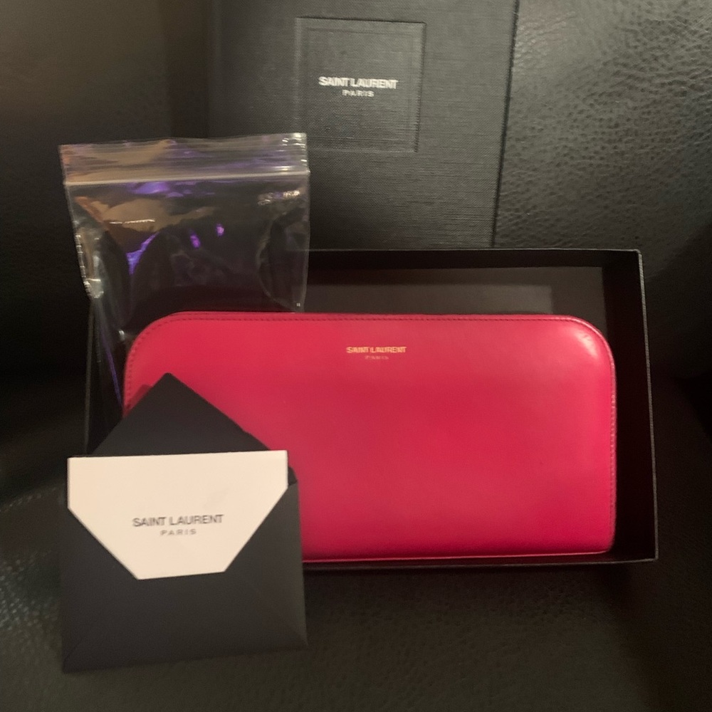 Authentic pink Saint Laurent zippy wallet